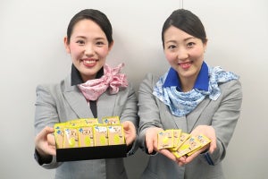 ANA、「明治ザ・チョコレート」をCAから手渡し--全クラスで計15万個